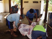 Petugas RPH menguliti hewan qurban