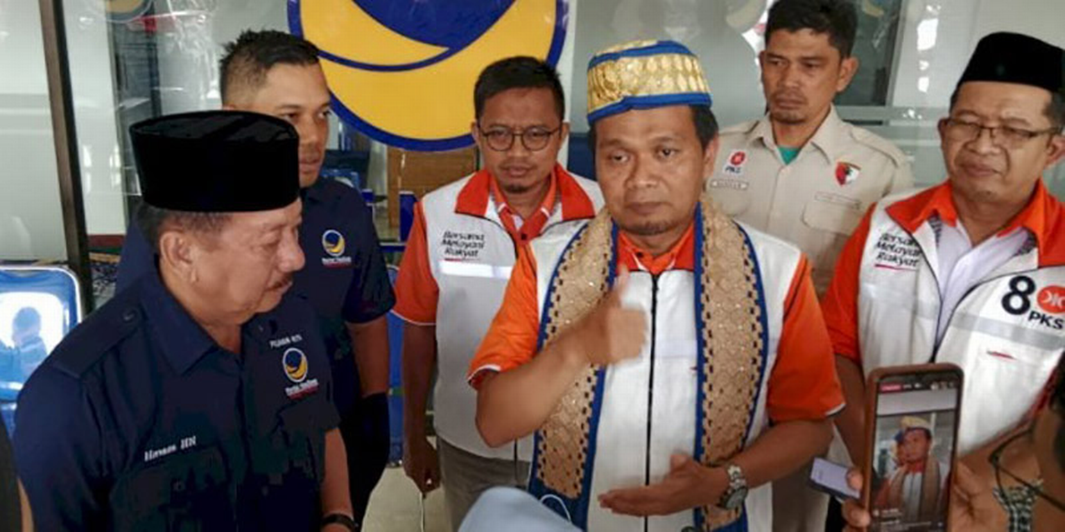 Ketua Nasdem Lampung Herman HN bersama Ketua PKS Lampung Ahmad Mufti Salim (RMOLLampung)